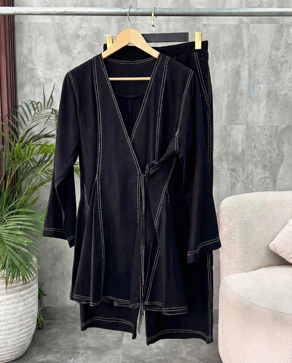 Jet black aura wrap style co ord set with side tie up and relaxed pants