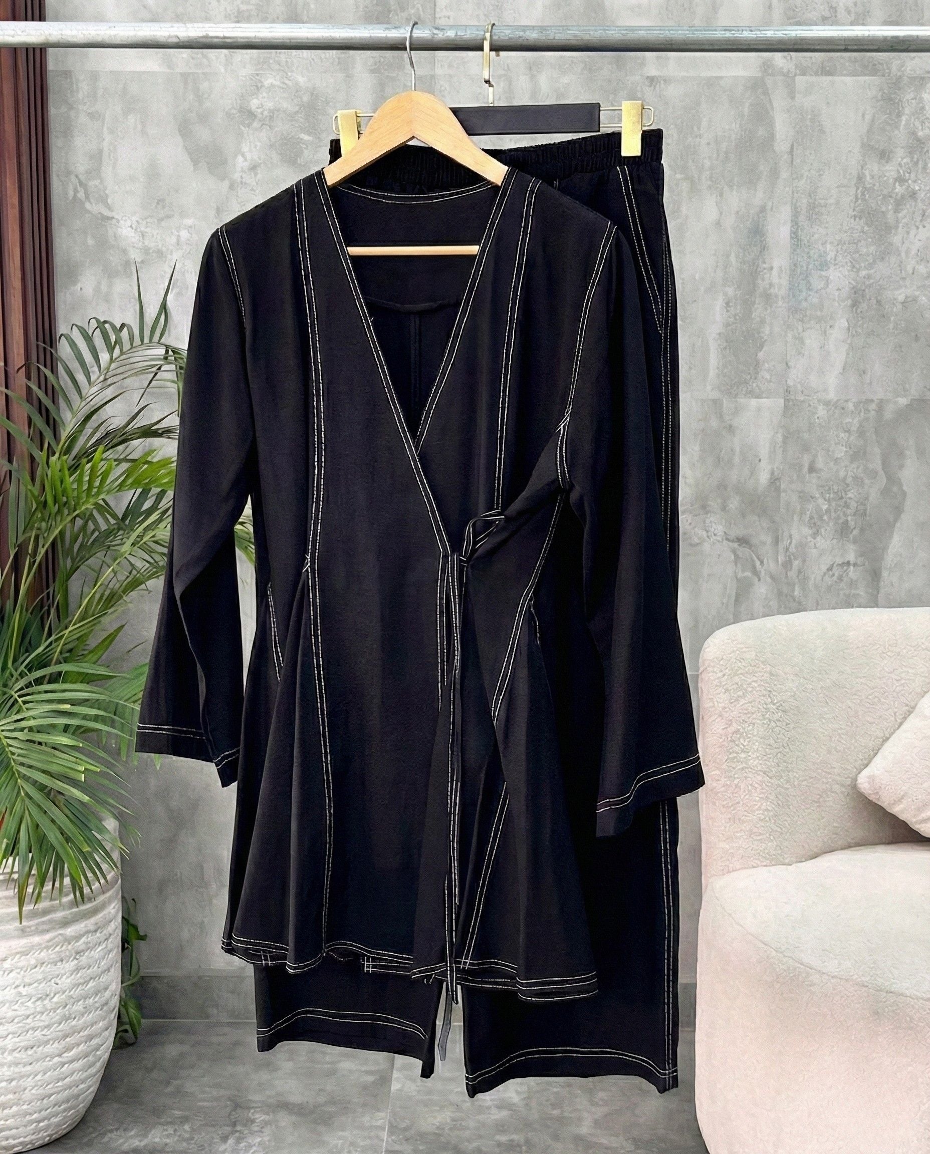 Jet black aura wrap style co ord set with side tie up and relaxed pants