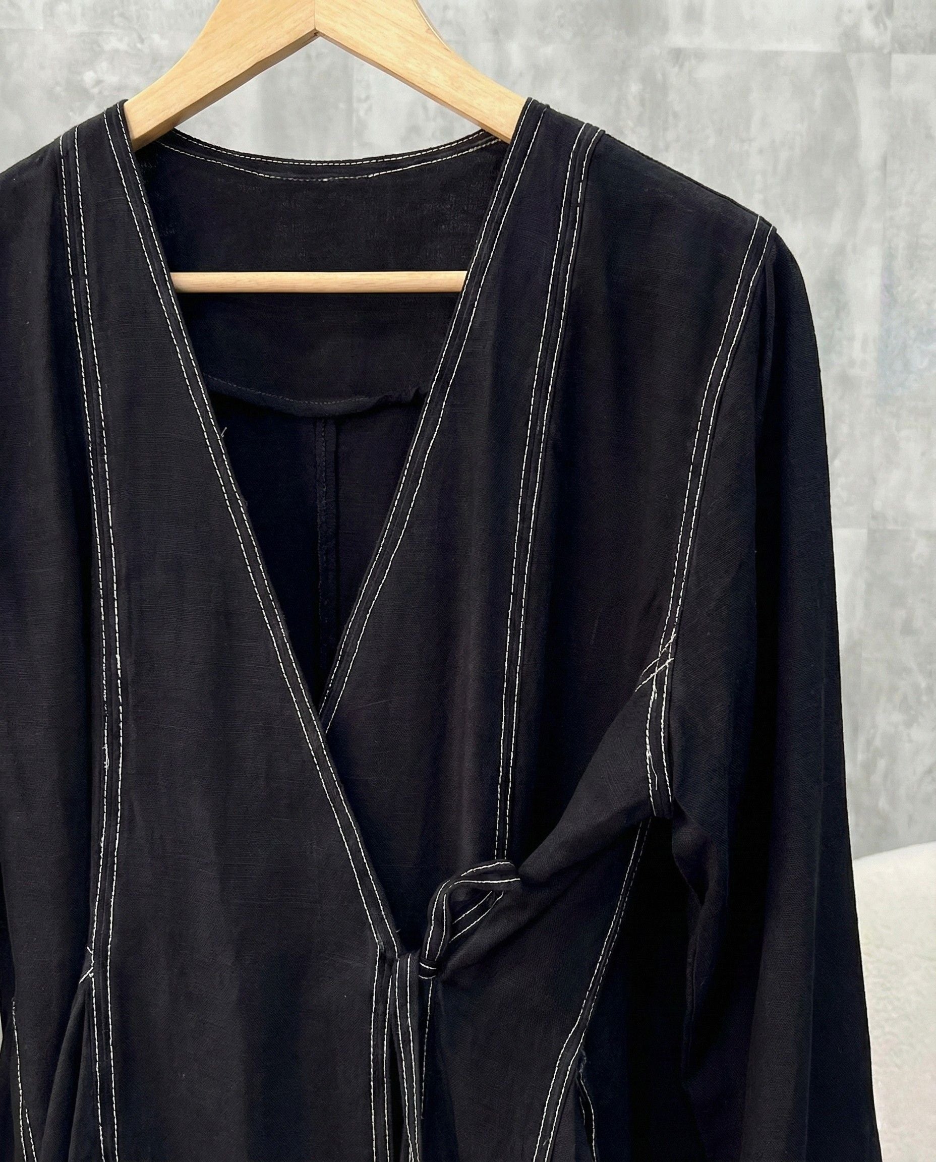 Jet black aura wrap style co ord set with side tie up and relaxed pants